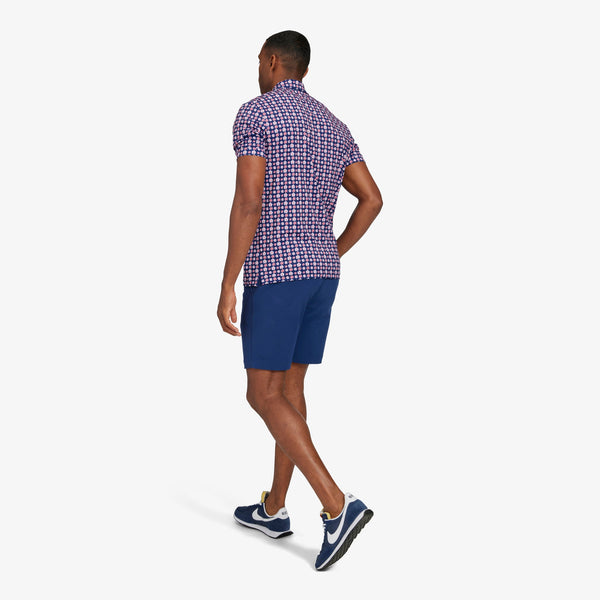 Versa Polo - Navy Red Floral, lifestyle/model photo